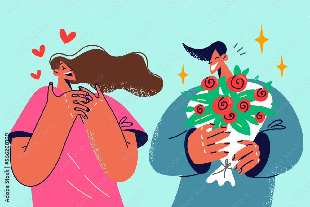 Naklejka premium Loving man present flowers to excited woman 