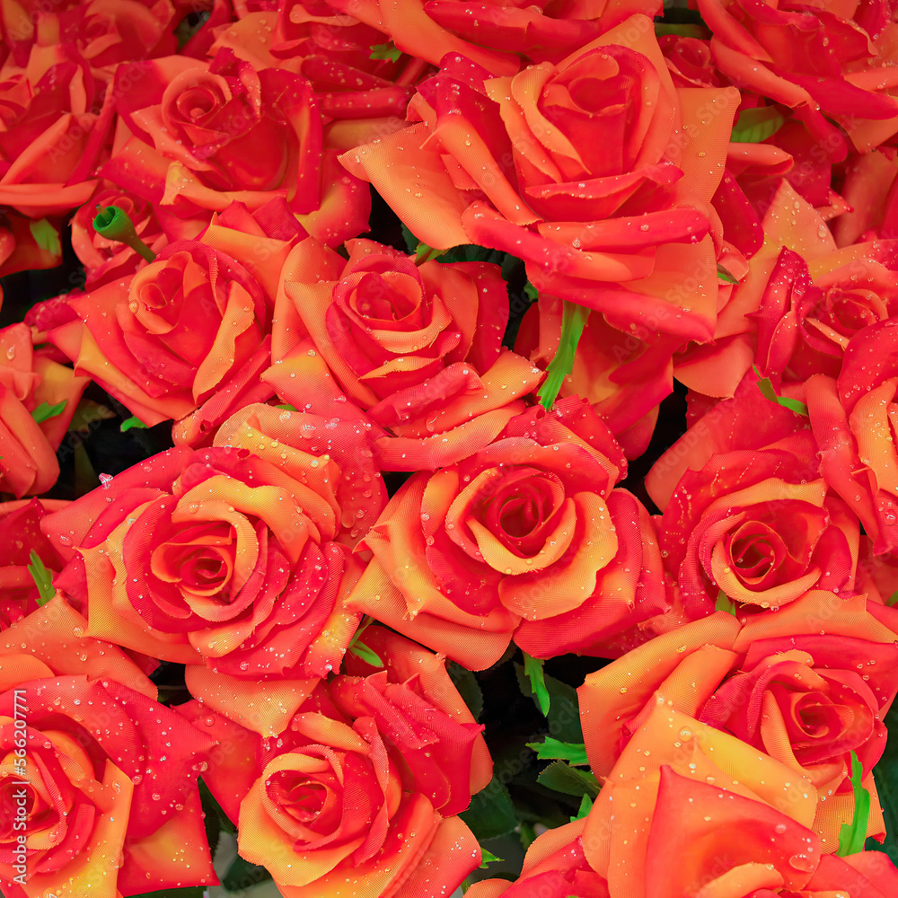 Dark orange artificial handmade roses with water drops bouquet, floral background. Dark orange artificial handmade roses with water drops bouquet, floral background.