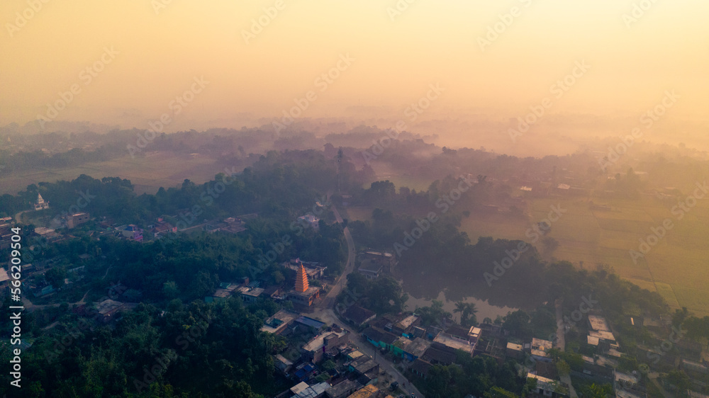 Aerial landscape view of a village in India, drone shot of Rural India during sunset or sunrise