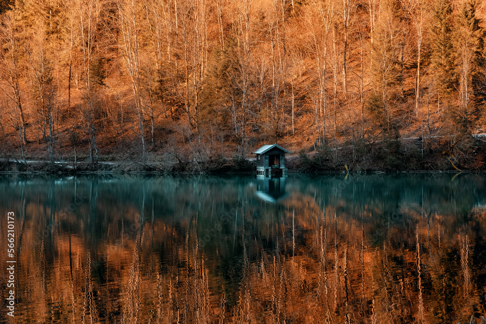 Fototapeta premium Mountain lake with water reflections at morning light. Salzburg country.