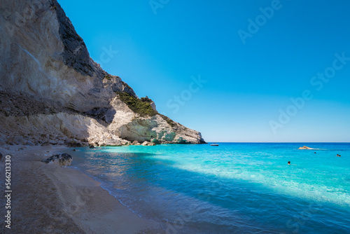 Scenic view of crystal clear turquoise waters of the Mediterranean sea meeting fine white sand at the White Beach on Zante, Zakynthos island, Greece