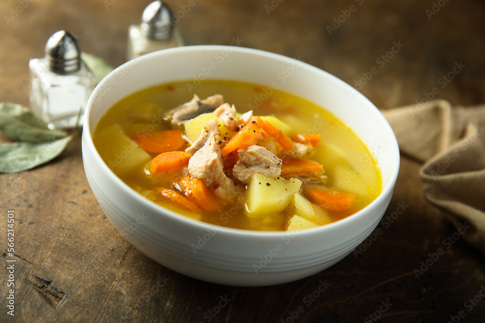 Traditional homemade fish soup with vegetables Traditional homemade fish soup with vegetables