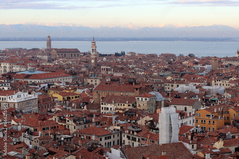 Venice city view from above. Golden hour photo. Beautiful Italian architecture in details. 