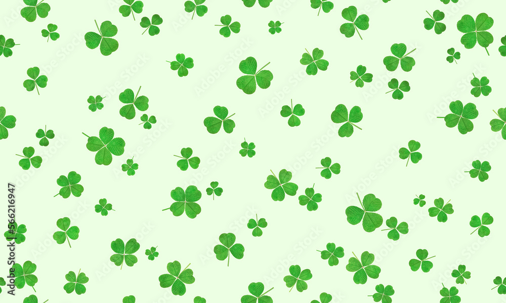 seamless pattern of clover leaves on a light background seamless pattern of clover leaves on a light background