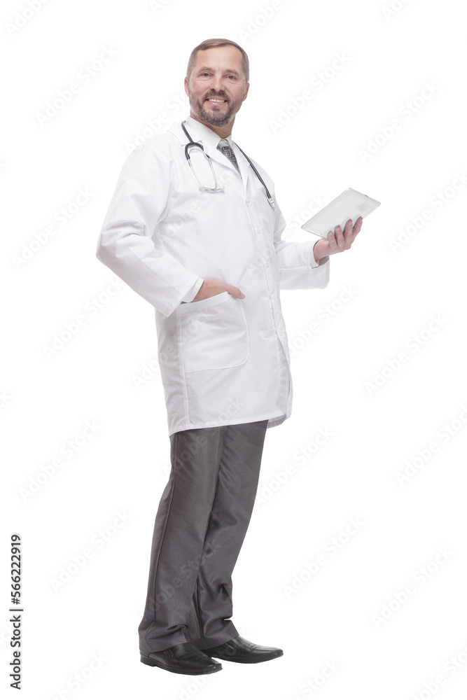 in full growth. smiling doctor with a digital tablet . in full growth. smiling doctor with a digital tablet .