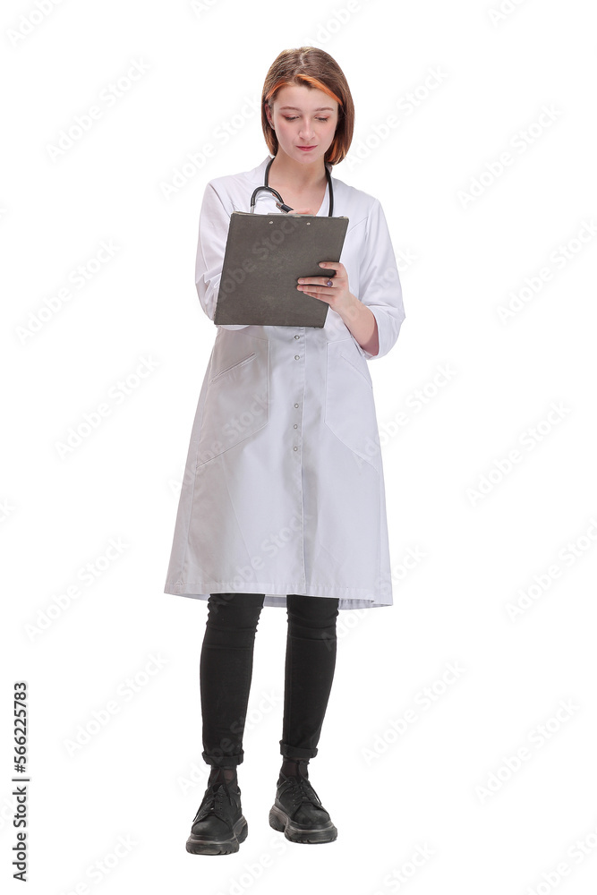 Happy smiling female doctor with stethoscope writing on clipboard Happy smiling female doctor with stethoscope writing on clipboard