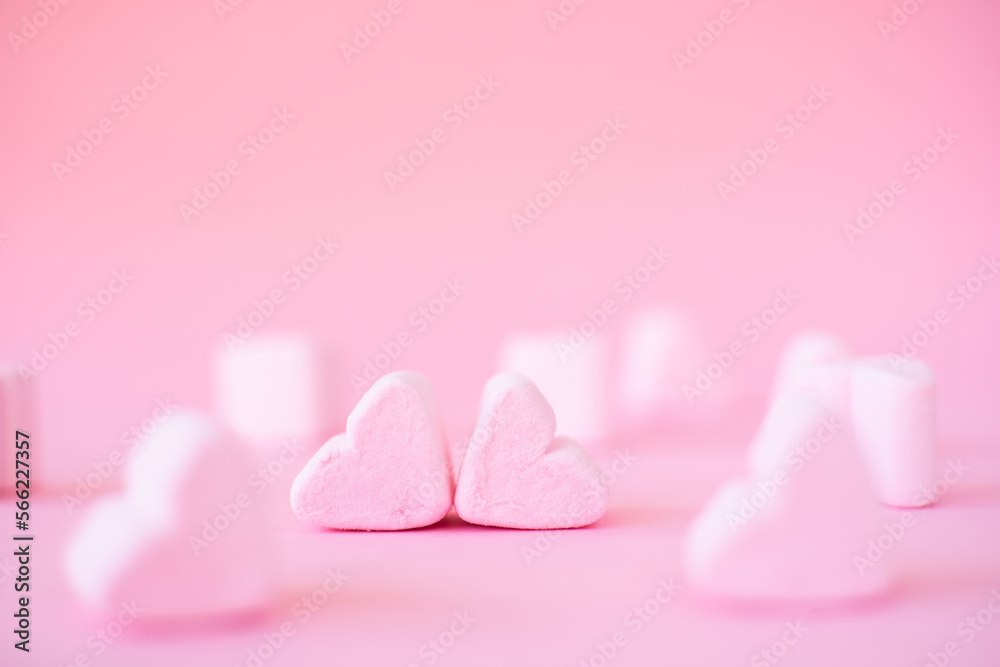 sweet heart shape of marshmallows on pink background. Decoration for love and valentine day concept. sweet heart shape of marshmallows on pink background. Decoration for love and valentine day concept.