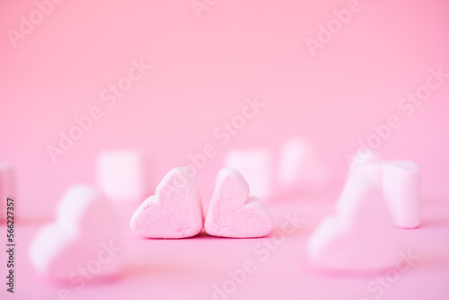Fototapeta Naklejka Na Ścianę i Meble -  sweet heart shape of marshmallows on pink background. Decoration for love and valentine day concept.
