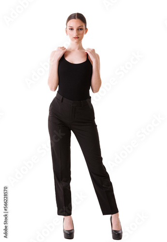 beautiful young model posing in photo studio on white background, dressed in black