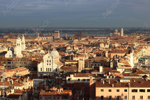 Venice city from above. Beautiful panoramic view of Italian city. Golden hour photo of Italy. Romantic tourist destination concept.  © Maya