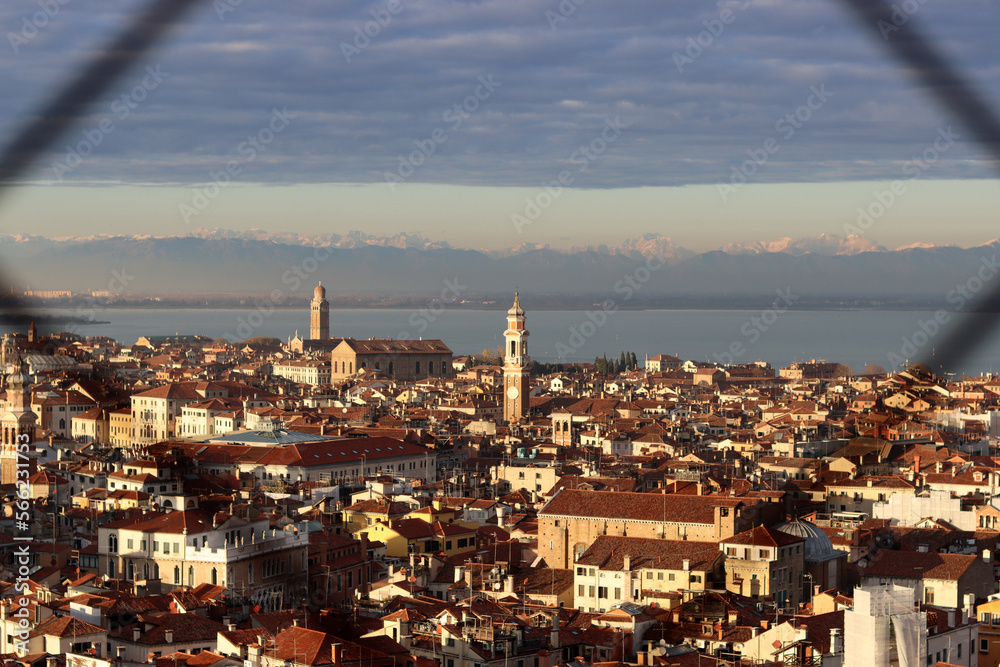 Venice city from above. Beautiful panoramic view of Italian city. Golden hour photo of Italy. Romantic tourist destination concept. 