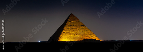 Pyramid of Khafre tinted gold at night photo