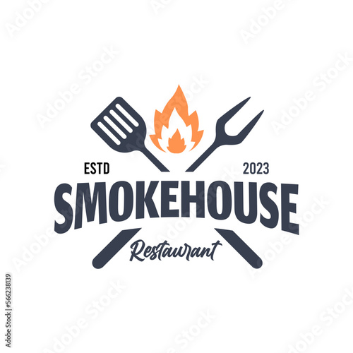 Vintage hipster Grill Barbeque barbecue bbq with fork spatula and fire flame Logo design