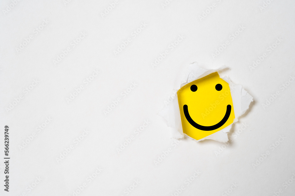 Smile face inside yellow background and white punch paper with copy space for positive mindset and client excellent evaluation concept , Customer experience and quality feedback concept. - obrazy, fototapety, plakaty 