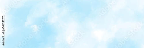 The sky has the light of the sun, the sky is blue, there are small and large clouds alternating and moving slowly. Blue sky and white clouds background
