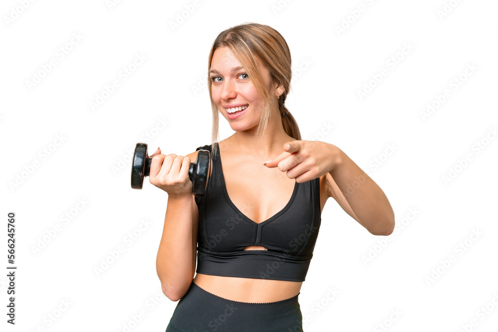 Blonde sport woman making weightlifting over isolated chroma key background points finger at you with a confident expression Blonde sport woman making weightlifting over isolated chroma key background points finger at you with a confident expression