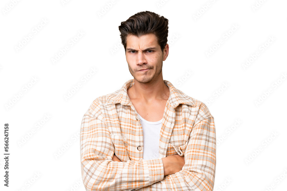 Young handsome caucasian man over isolated background with unhappy expression Young handsome caucasian man over isolated background with unhappy expression