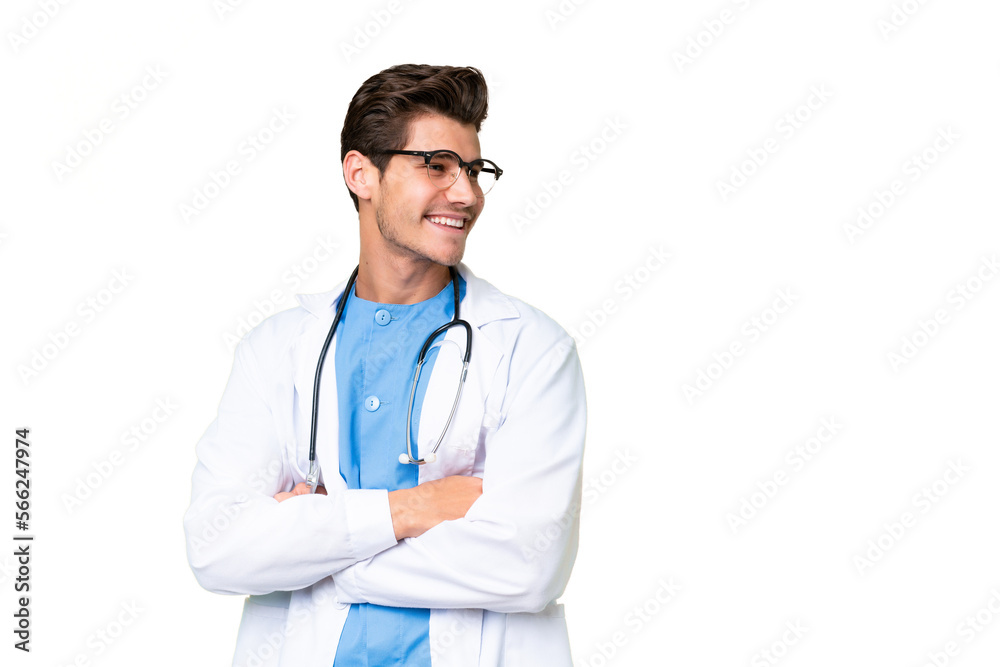 Young doctor man over isolated background with arms crossed and happy Young doctor man over isolated background with arms crossed and happy