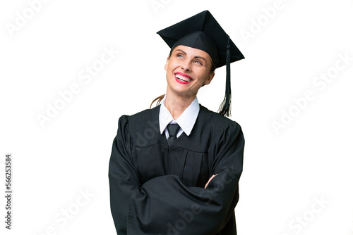 Young university graduate caucasian woman over isolated background looking up while smiling
