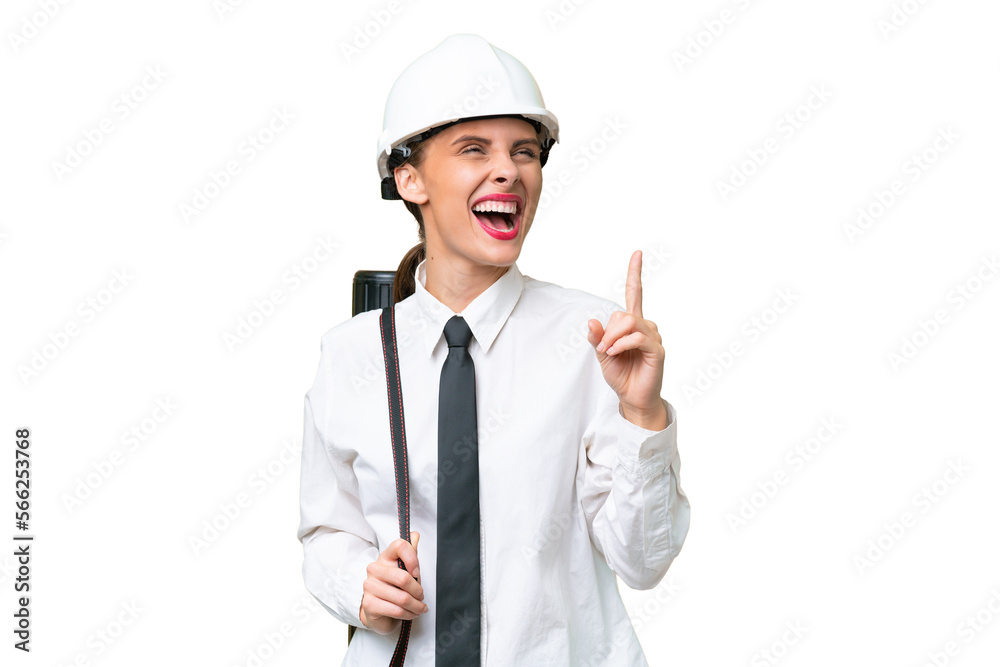 Young architect woman with helmet and holding blueprints over isolated background pointing up a great idea