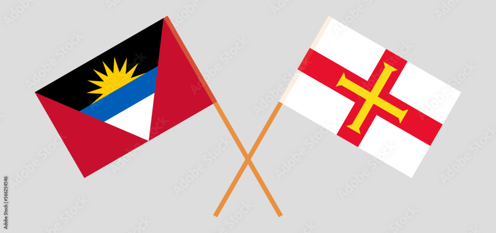Crossed flags of Antigua and Barbuda and Bailiwick of Guernsey. Official colors. Correct proportion