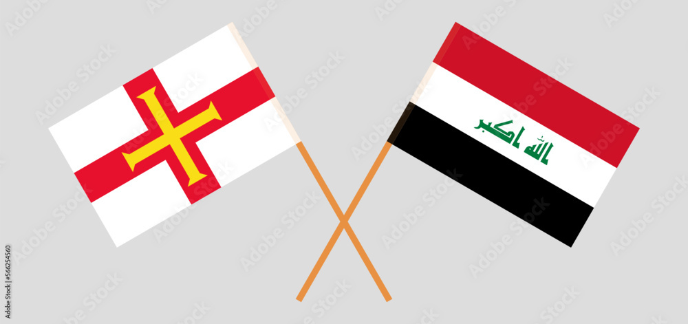 Crossed flags of Bailiwick of Guernsey and Iraq. Official colors. Correct proportion