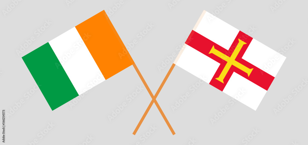 Crossed flags of Ivory Coast and Bailiwick of Guernsey. Official colors. Correct proportion