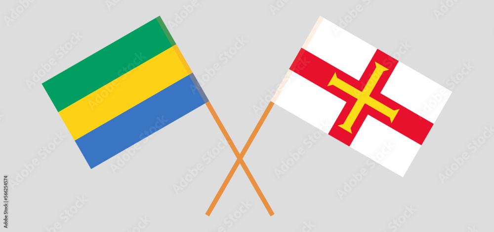 Crossed flags of Gabon and Bailiwick of Guernsey. Official colors. Correct proportion