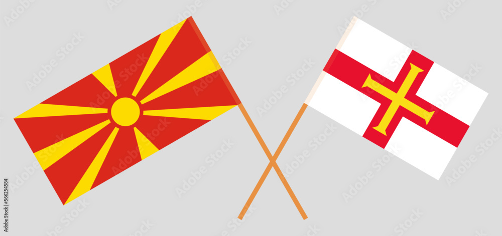 Crossed flags of North Macedonia and Bailiwick of Guernsey. Official colors. Correct proportion