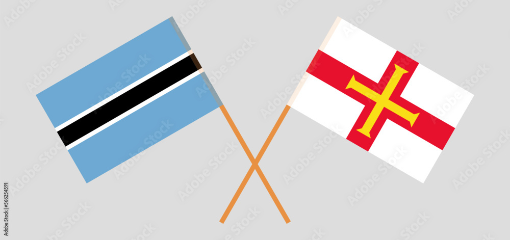 Crossed flags of Botswana and Bailiwick of Guernsey. Official colors. Correct proportion