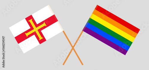 Crossed flags of Bailiwick of Guernsey and LGBTQ. Official colors. Correct proportion