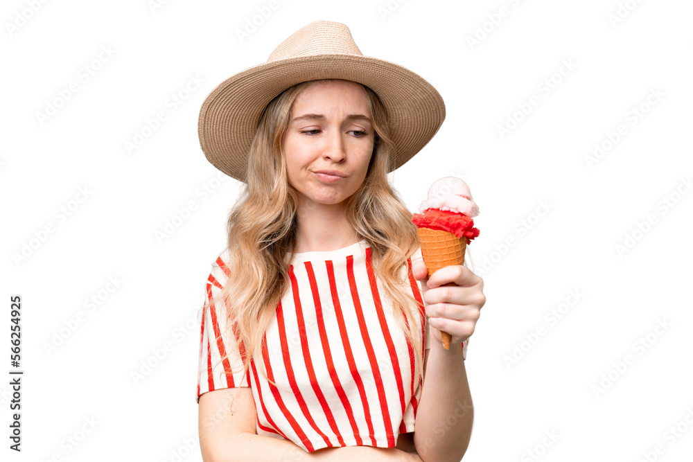 Young English woman with a cornet ice cream over isolated background with sad expression Young English woman with a cornet ice cream over isolated background with sad expression