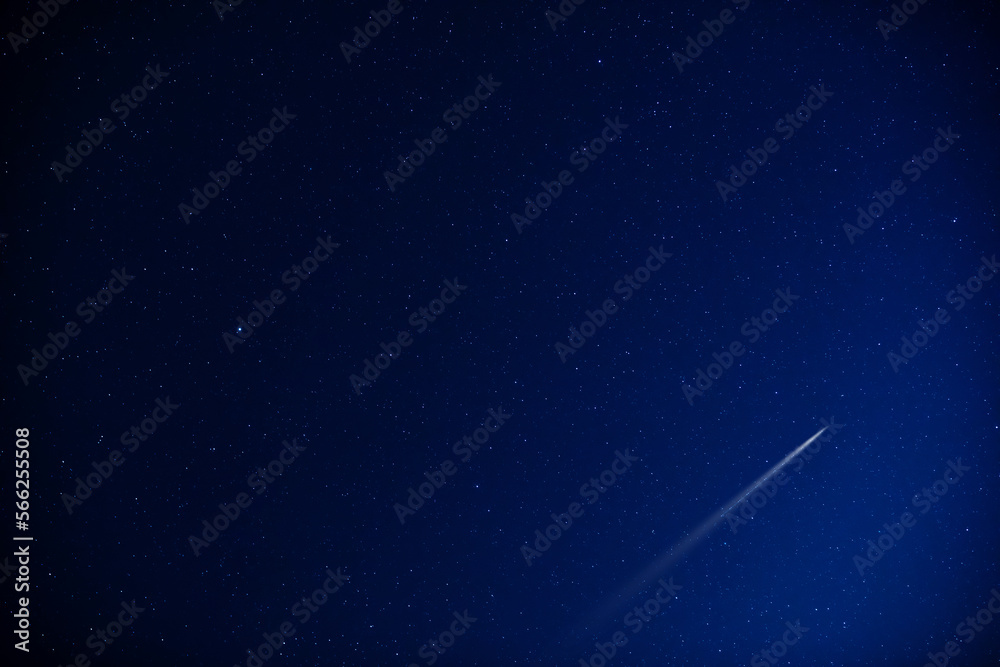 Starry Milky Way skies with comet and meteor shower, falling and shooting stars. Starry Milky Way skies with comet and meteor shower, falling and shooting stars.