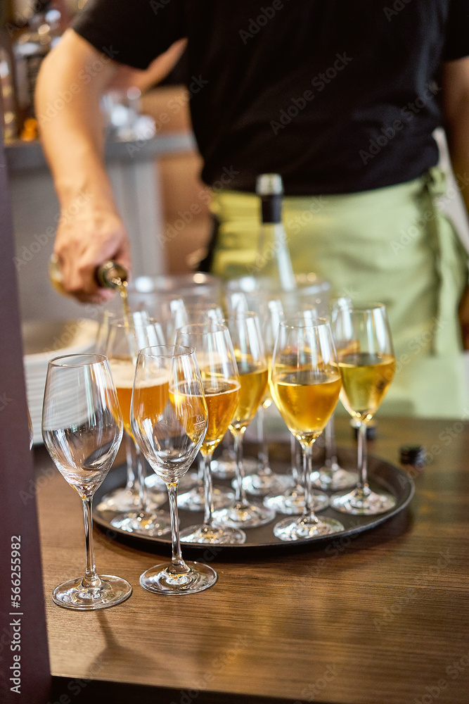 waiter serving champagne