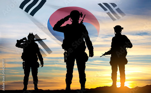 Silhouettes of soldiers on background of sunset and South Korea flag. Armed forces of Korea. Background for Memorial Day, Liberation Day. EPS10 vector