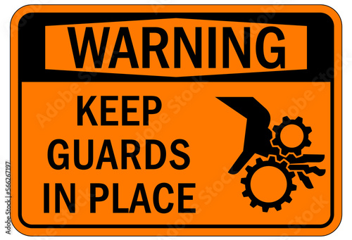 Machine guarding sign and labels keep guards in place
