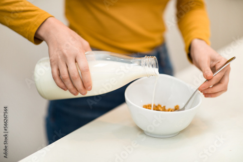 Unrecognizable woman making healthy breakfast at home, closeup