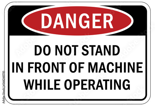 machine hazard sign and labels do not stand in front of machine while operating