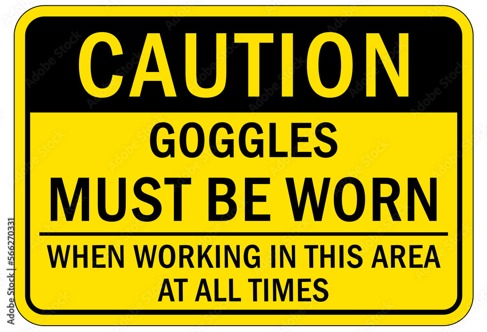 Fototapeta premium Protective equipment sign and labels goggles must be worn when working in this area at all times