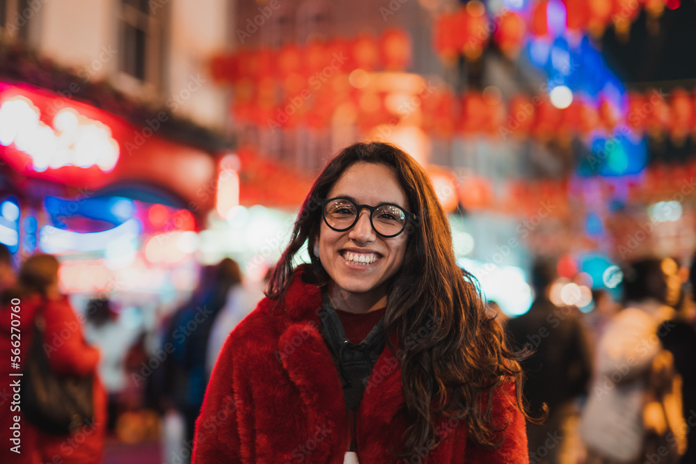 Cheerful woman admiring city street