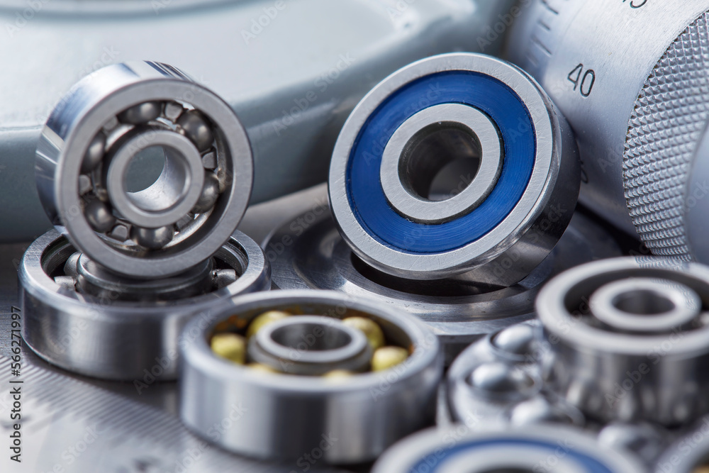 different bearings on a metal background. Part of mechanism. different bearings on a metal background. Part of mechanism.