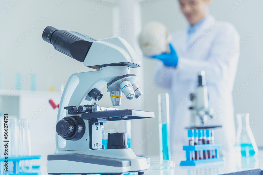 Science microscope equipment in biology chemical laboratory. Scientific ...