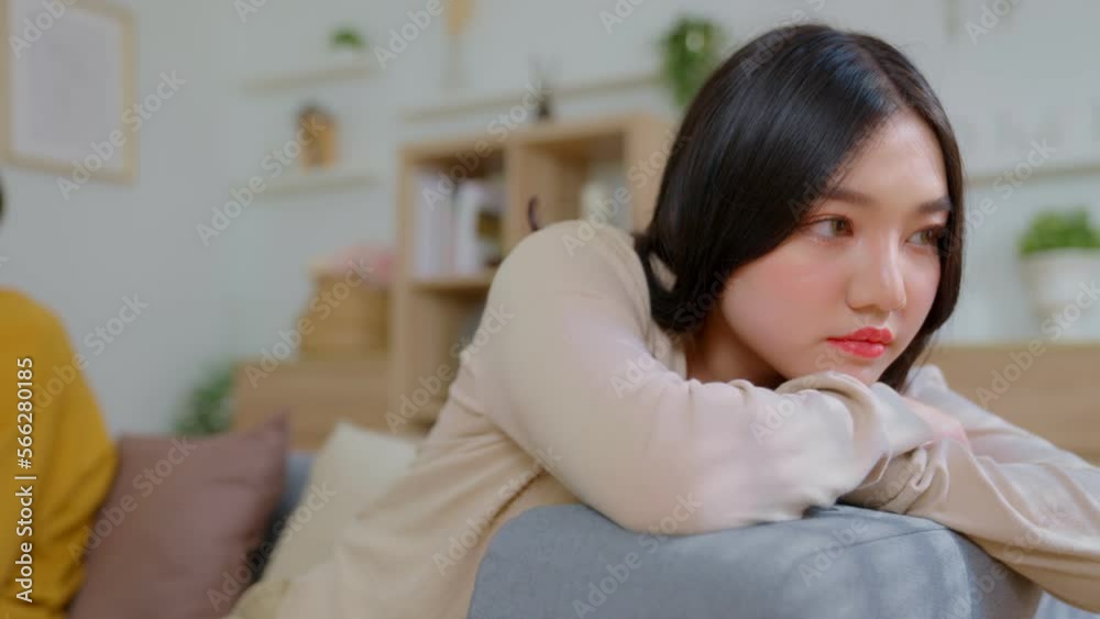 Asian couple sit separate on couch having relationships problems, stressed upset .Asia husband and wife avoid talking, sad man and woman think of divorce or breakup. Disappointed and saddened Asian couple sit separate on couch having relationships problems, stressed upset .Asia husband and wife avoid talking, sad man and woman think of divorce or breakup. Disappointed and saddened