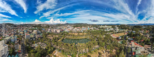 Baguio City, Philippines - Jan 2023: Panoramic aerial of Burnham Park and downtown Baguio.