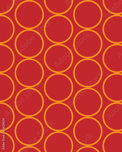 Orange circles on a red background repeating pattern