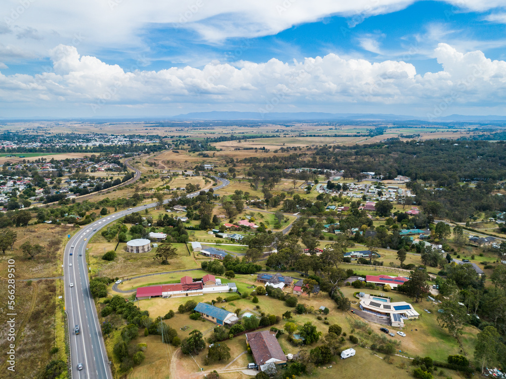 Homes beside highway in hunter valley in out of town semi rural area Homes beside highway in hunter valley in out of town semi rural area