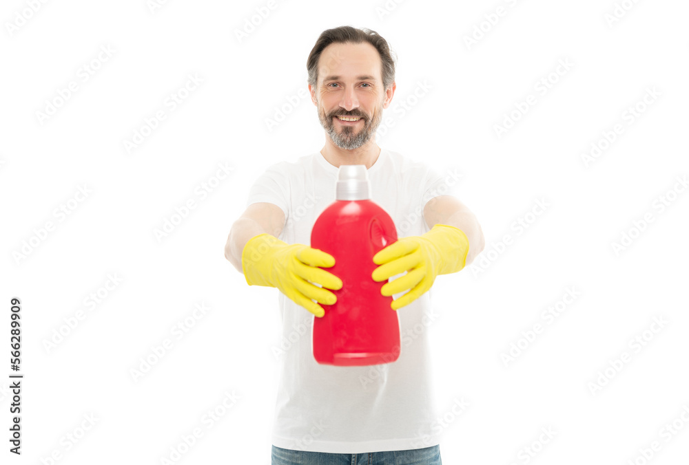 photo of happy man with laundry detergent bottle. man with laundry detergent
