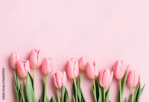 Fototapeta Naklejka Na Ścianę i Meble -  Bouquet of pastel pink colored tulips flowers on pastel pink background. Valentine's Day, Easter, Birthday, Happy Women's Day, Mother's Day. Flat lay, top view, copy space