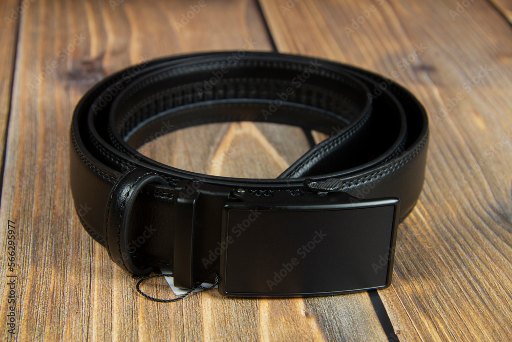 Men's black leather belt. Black buckle Men's black leather belt. Black buckle