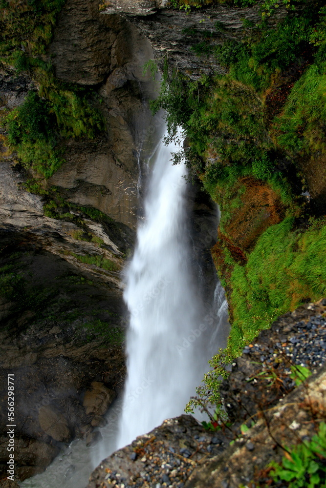 A close-up view of the mighty Rychenbachfall waterfall in a mountain gorge near Meiringen, Switzerland A close-up view of the mighty Rychenbachfall waterfall in a mountain gorge near Meiringen, Switzerland